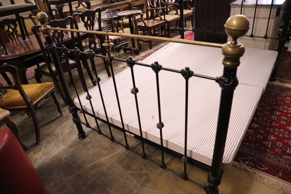 A Victorian style metal and brass double bed frame, width 140cm